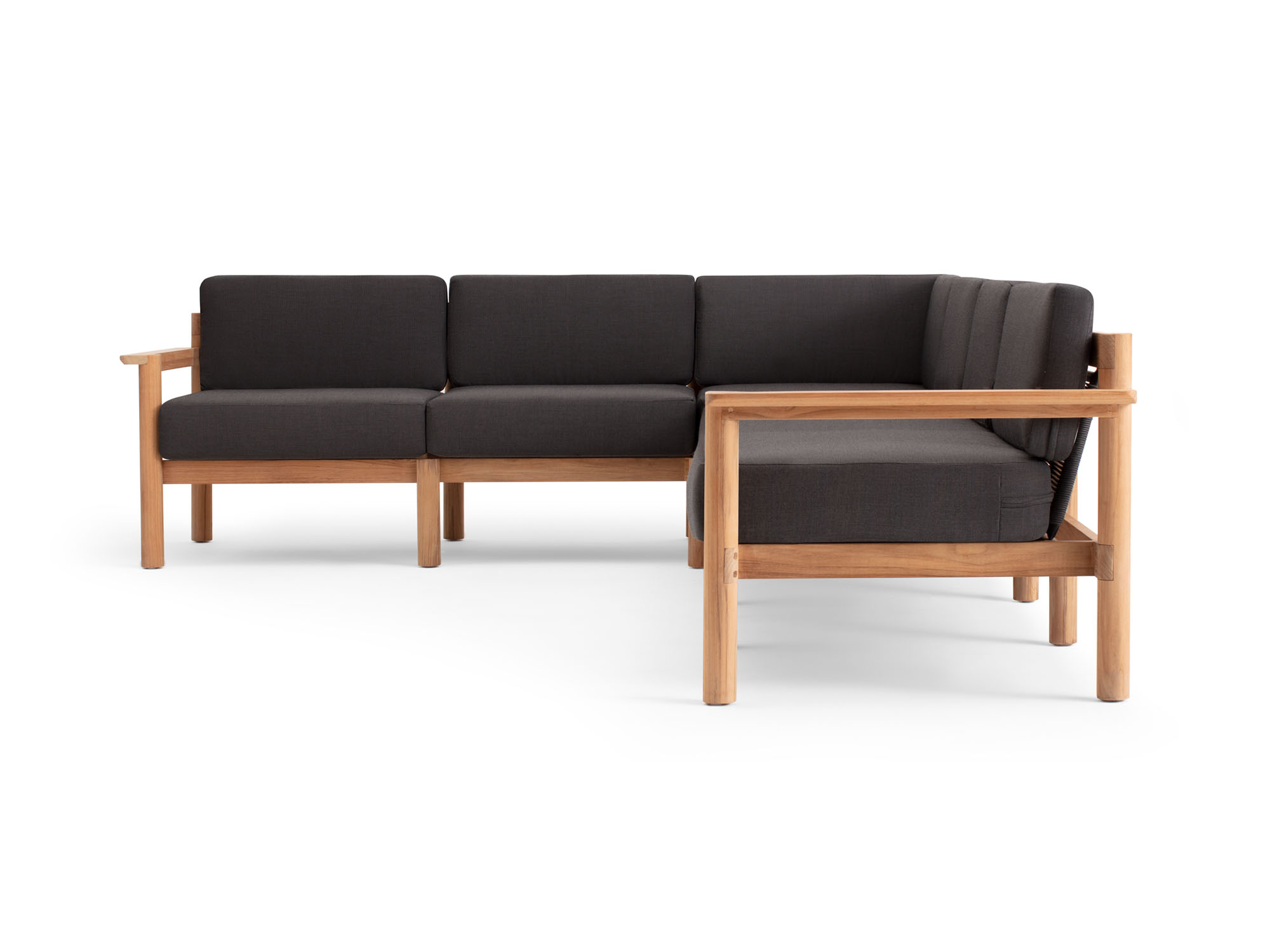 Side view of 6-piece outdoor sectional with black cushions